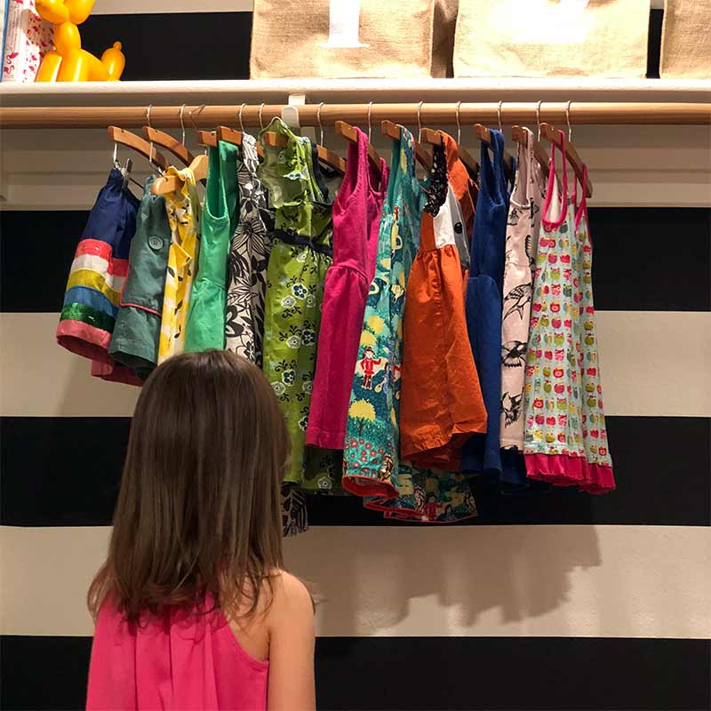 Closet After - Little E Looking at Dresses